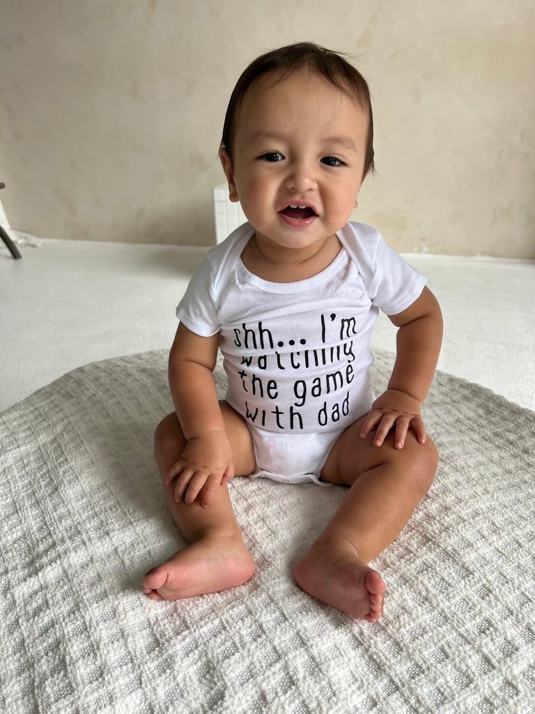Shh...I'm Watching The Game With Dad Baby Onesie®