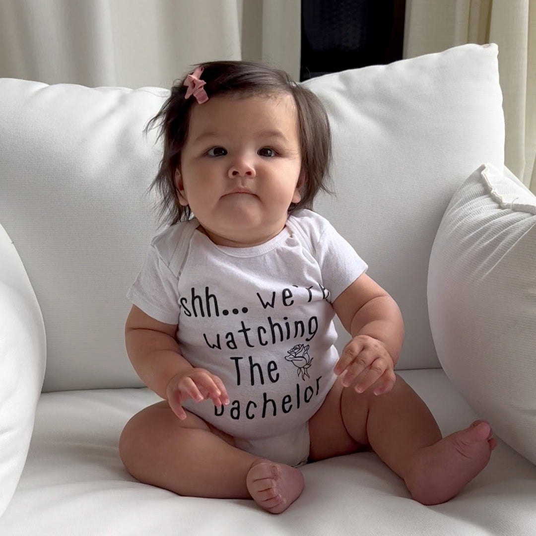 Shh…We’re Watching the Bachelor Baby Onesie®