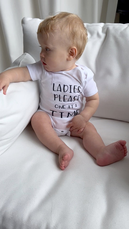 Ladies, Please One At A Time Baby Onesie®
