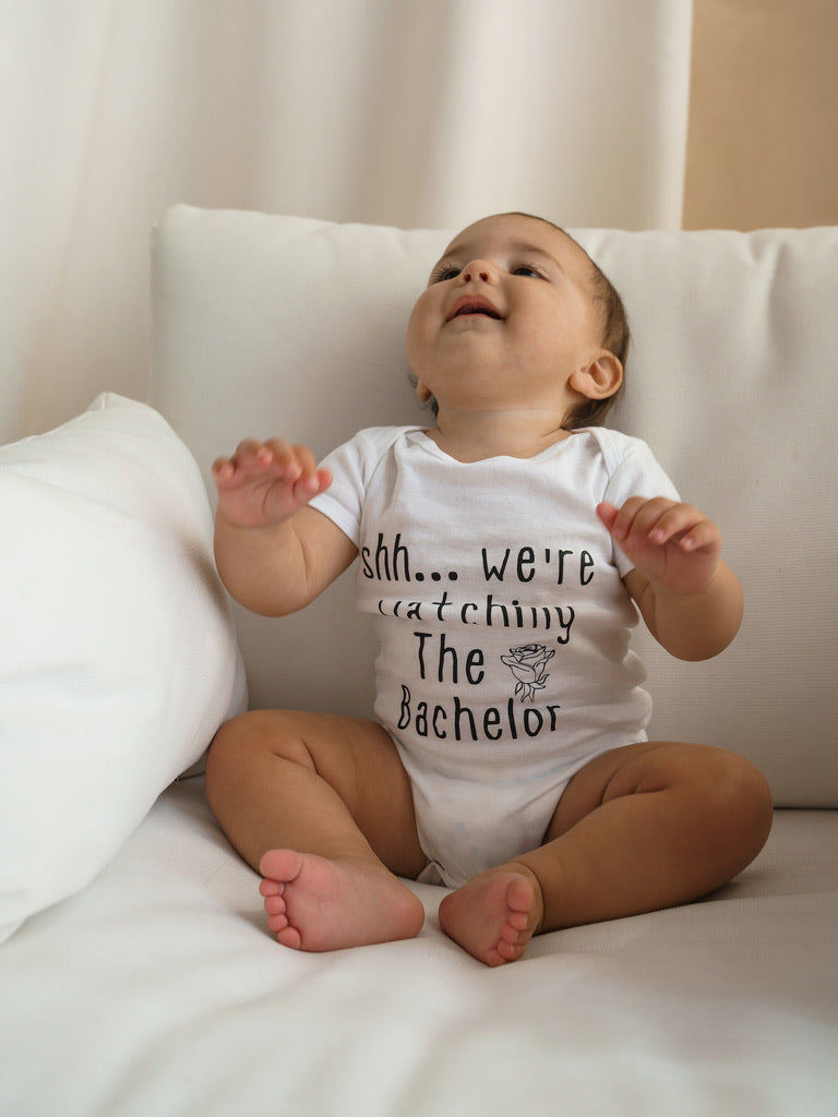 Shh…We’re Watching the Bachelor Baby Onesie®