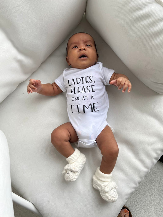 Ladies, Please One At A Time Baby Onesie®