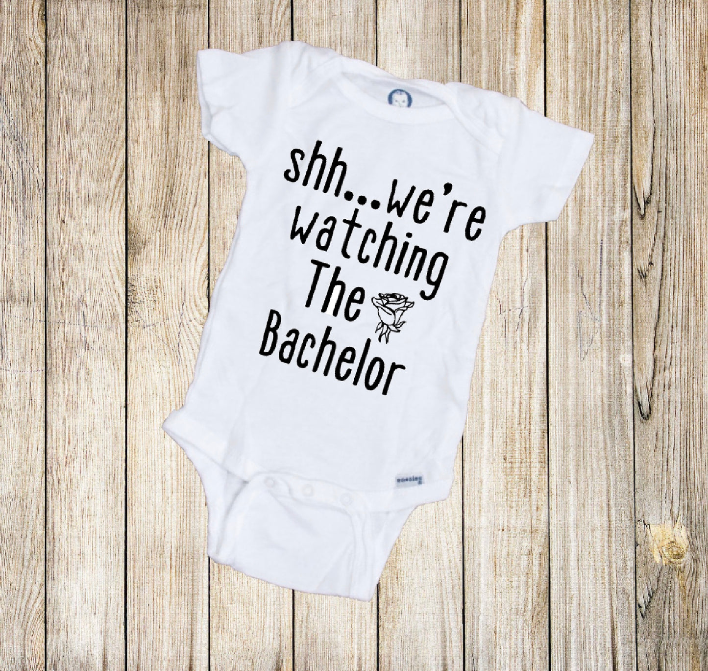 Shh…We’re Watching the Bachelor Baby Onesie®