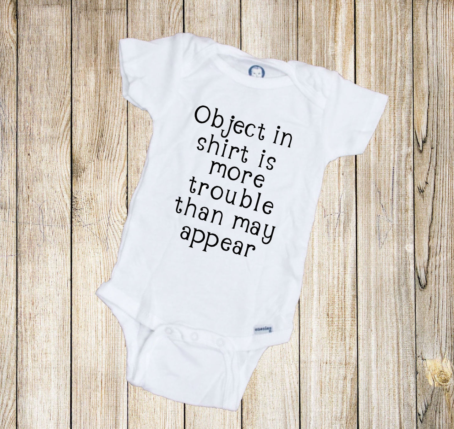 Object In Shirt Is More Trouble Than May Appear Baby Onesie®