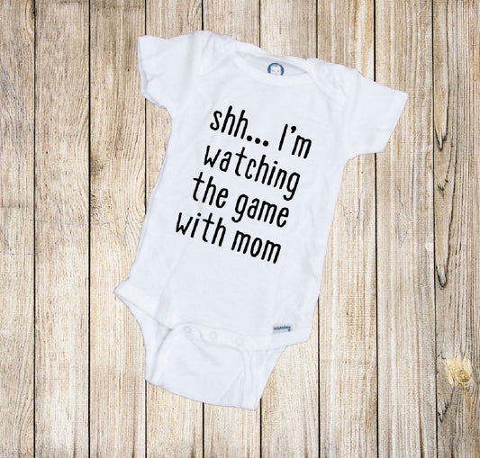Shh...I'm Watching The Game With Mom Baby Onesie®